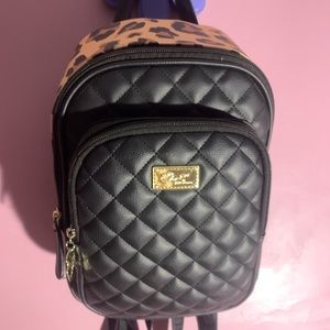 Betsey Johnson cheetah print backpack purse
